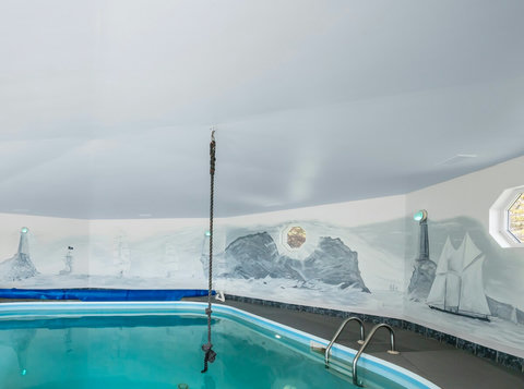 One-of-a-kind artwork by Dale Heath. It feels like you're in the water with the ships!