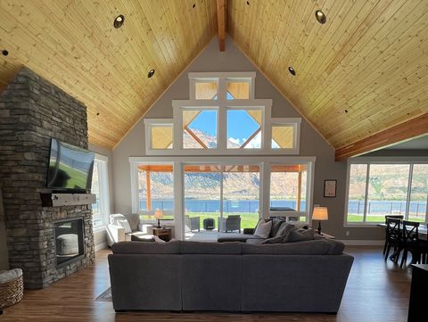Vaulted pine ceiling with wall of windows for lots of light and spectacular view