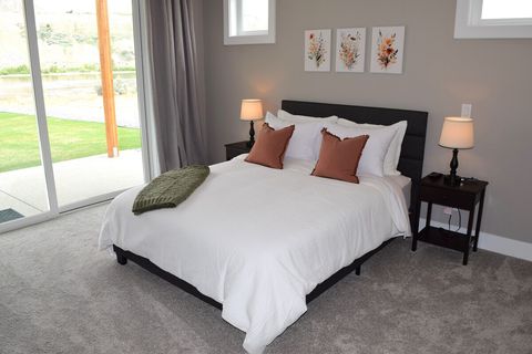 Main level bedroom #1 with Queen Bed & ensuite bathroom