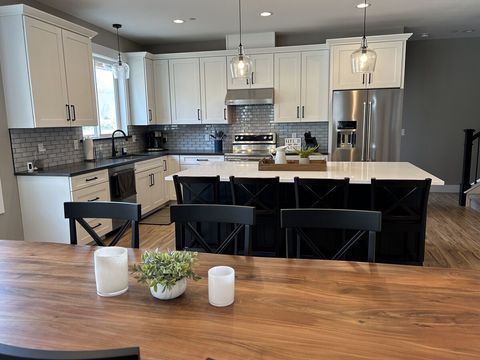 Full kitchen with electric double oven range!