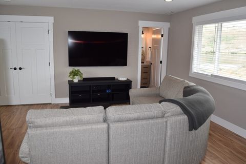 Bonus room perfect for hanging out with 70" TV, video games, and a DVD library