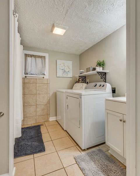 Second bathroom with tub/shower and washer and dryer