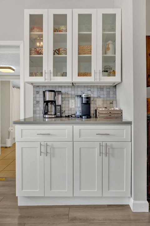 Coffee bar with Keurig and drip coffee makers.