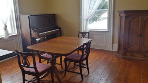 Spacious Dining Room with a few antique peices 
