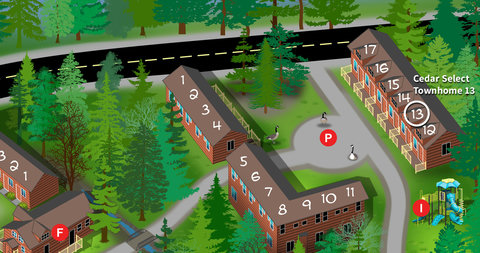 Cedar select townhome 13 located in a wooded community near a playground and parking area.