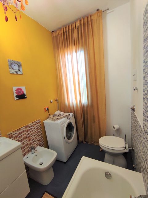 The bathroom has a new washing machine, guests can use it!. 