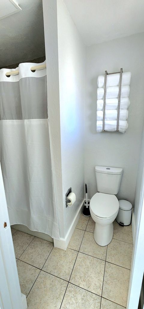 Modern clean and airy bath/toilet room.