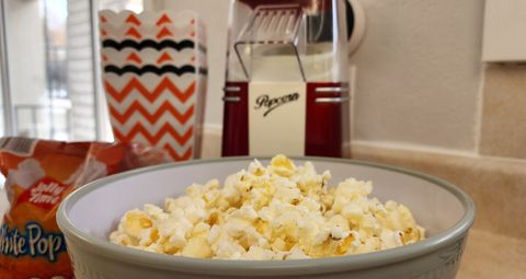 Complementary popcorn and a popcorn maker.