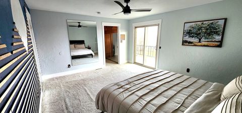 The master has an ensuite bathroom and balcony. 