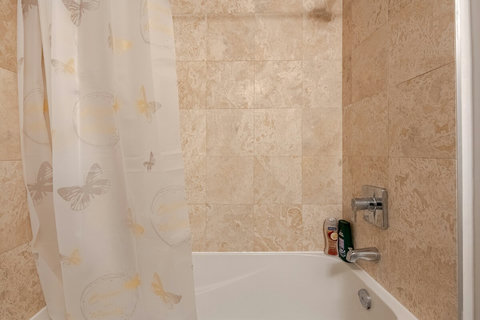 Sparkling Clean & Fully Stocked – Everything You Need to Refresh - 
Enjoy a clean, modern bathroom with fresh towels, toiletries, and a relaxing shower – perfect for unwinding after a day out.