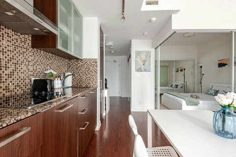 Cook Like Home – Fully Equipped Kitchen with Ceramic Pans - 
Whip up meals with ease in this modern kitchen stocked with ceramic non-stick pans, full-size appliances, and all the essentials.