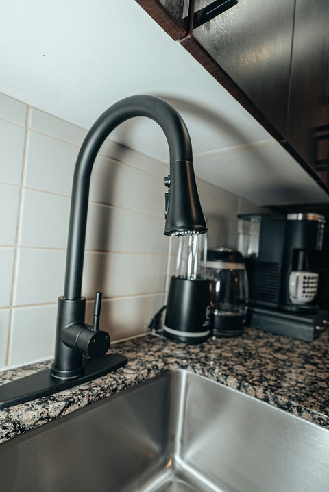 Modern and stylish kitchen with black accents