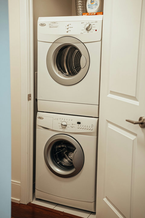 In suite laundry with detergent and fabric softer provided