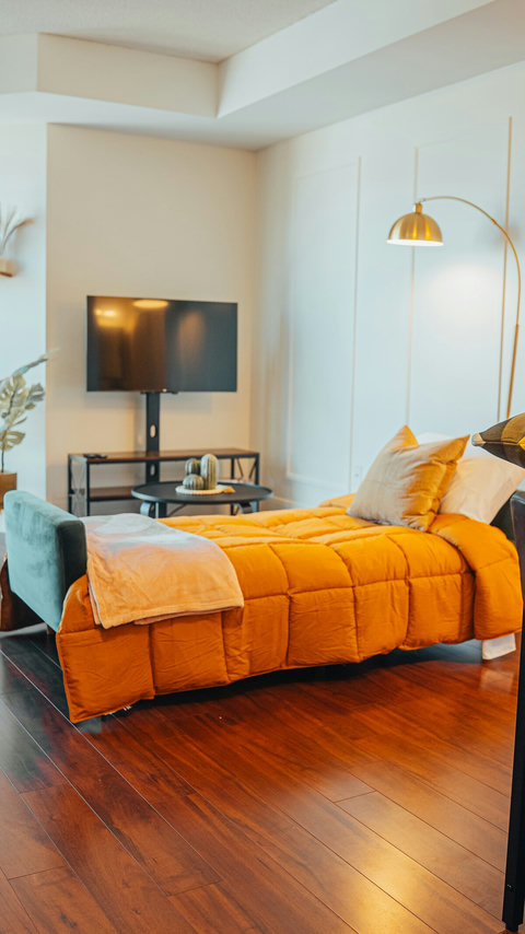 This comfortable sofa quickly transforms into a cozy bed, perfect for accommodating an extra guest