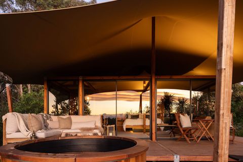 Take a sunset plunge in the Cedar Hot Tub