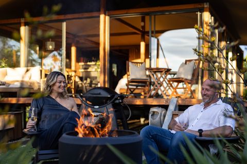 Relax around the fire with a wine