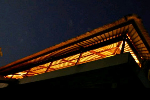 Villa at night.