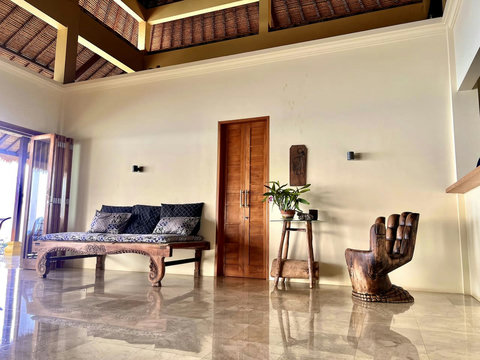 Living area with original balinese bed