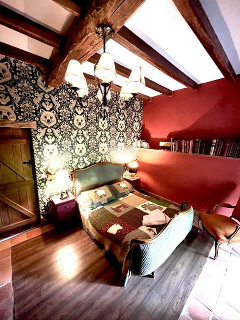 Double doors open to the garden in each of the downstairs bedrooms