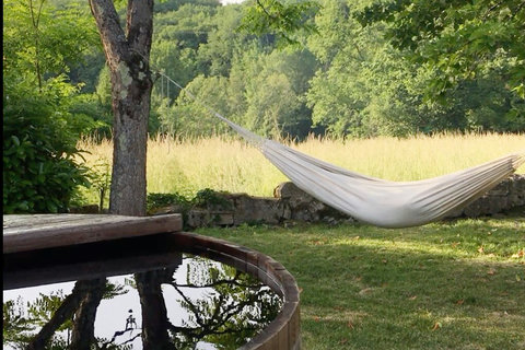 The place to finish the day! The wood-fired hot tub and hammock.. 