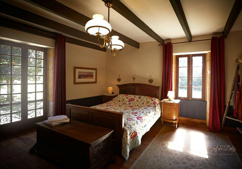 The master bedroom with views across the gardens