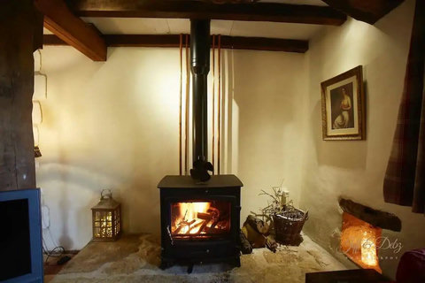 Wood stove for cosy evenings in the lounge