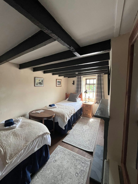 Twin bedroom with a view up Eilian Mountain