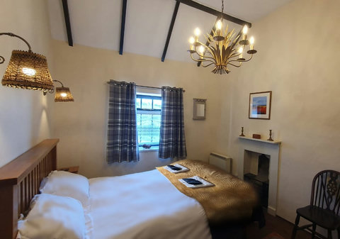 Double bedroom with a view up Eilian Mountain