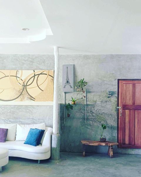 In front of 2 bedrooms with different designs