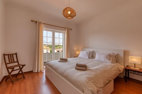 King size bed with access to the balcony