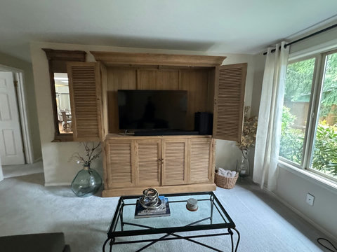 Living Room Retreat: Bright space with natural light, stylish furnishings, and homey decor awaits!