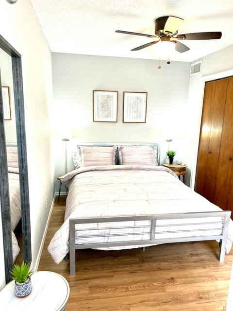 Dreamland Retreat: Experience Ultimate Comfort in the Luxurious Bed, Ample Closet Space, and Serene Reading Lamps