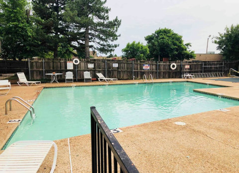 Poolside Paradise: Dive into Relaxation and Soak Up the Sun on the Inviting Sunbathing Chairs in our Shared Pool Area