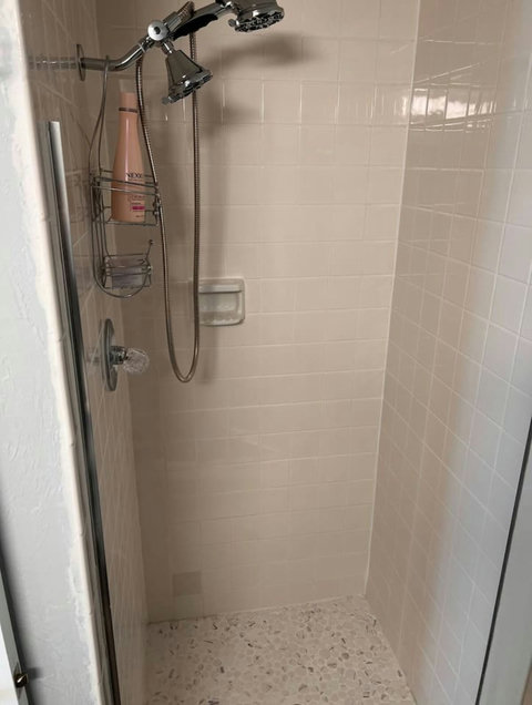 Pure Tranquility: Immerse Yourself in Refreshing Luxury with a Spotlessly Clean Bathroom and Invigorating Stand-Up Shower