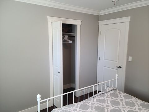 Spacious closet for suitcases.  